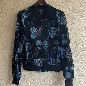 Colorful jacket that is light weight.  Goes great with jeans or dressed up.